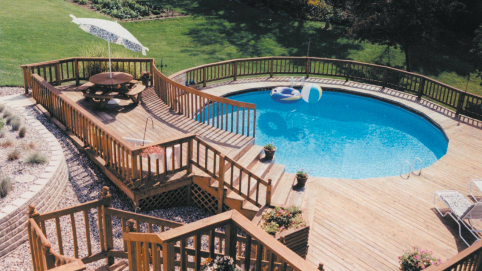 Semi-Onground Doughboy Pool with a Deck