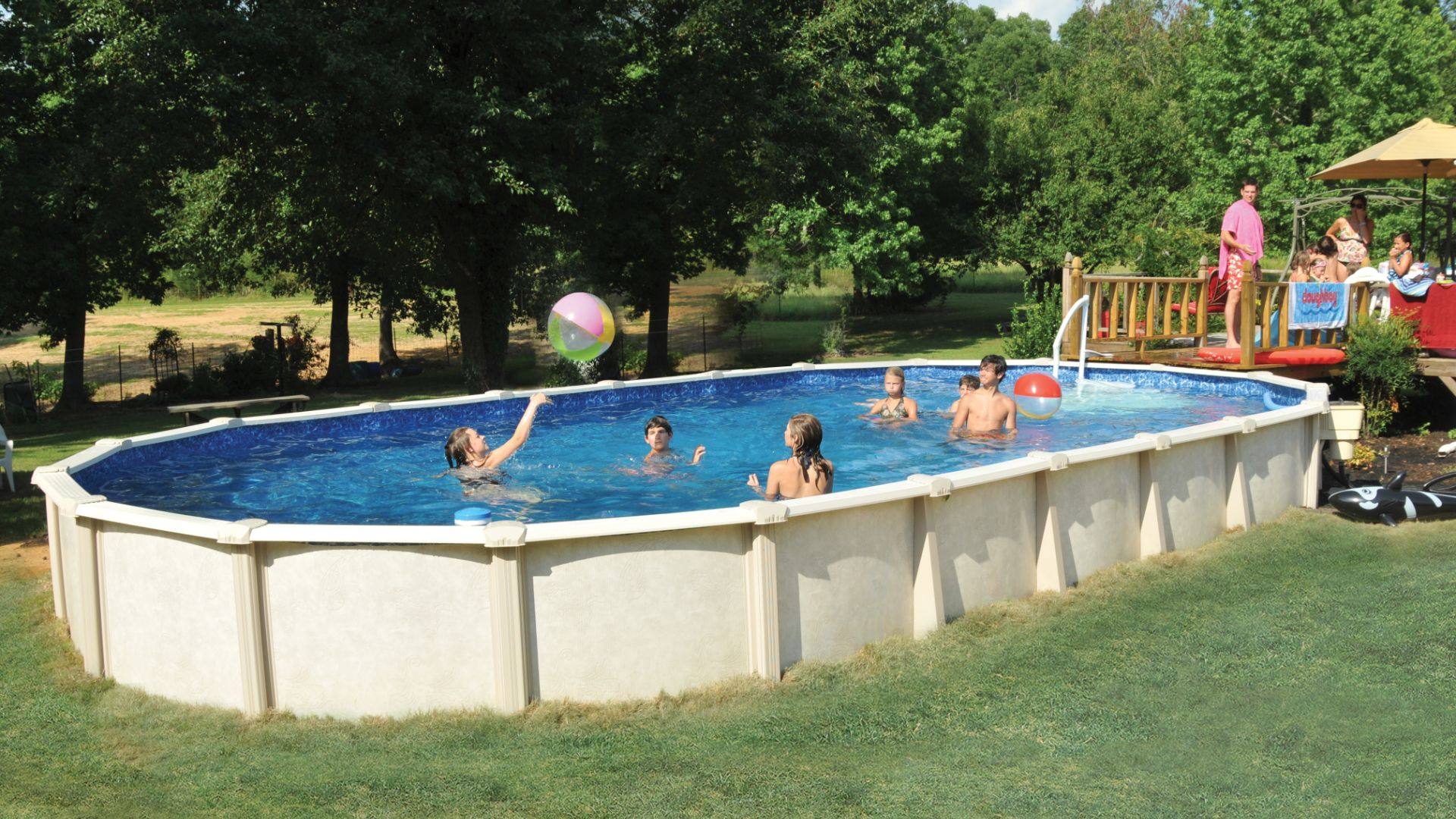 Family and Friends Playing in a Doughboy Pool