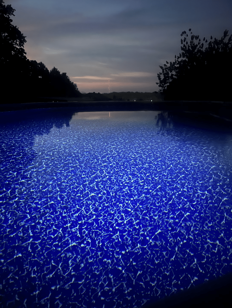 A Doughboy pool in the evening.
