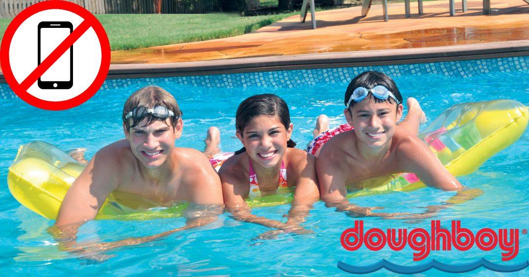 Three kids are leaning on a new pool float in a Doughboy pool. There is an image of a phone with a cross through it in the top left corner.