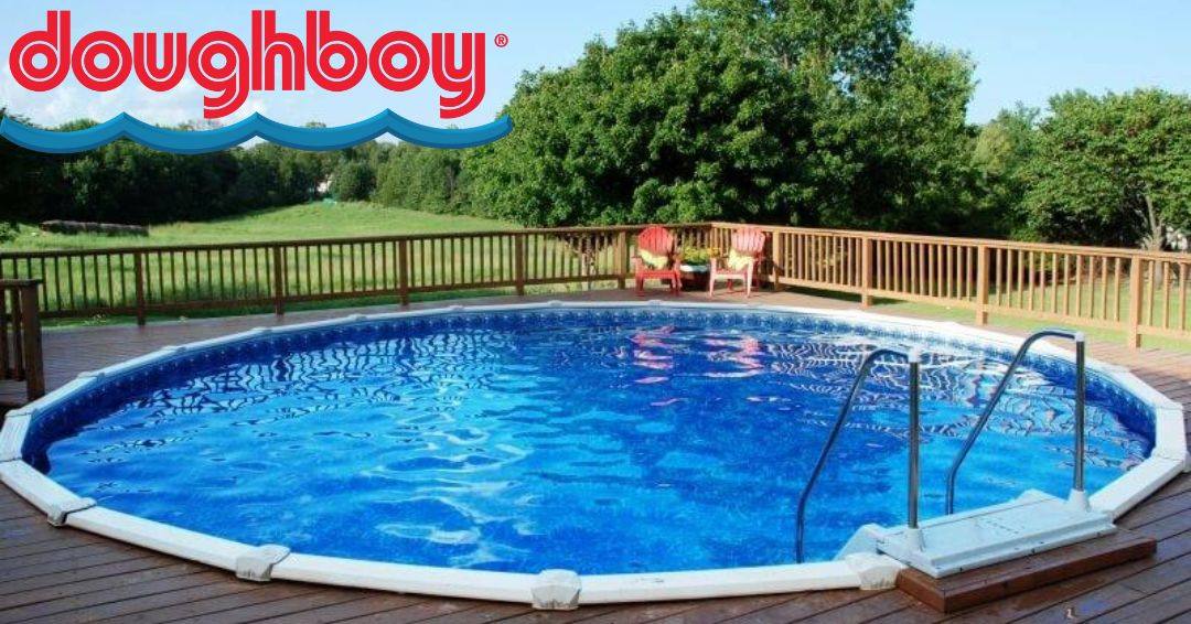 A Doughboy Swimming Pool is nested in a wooden deck.