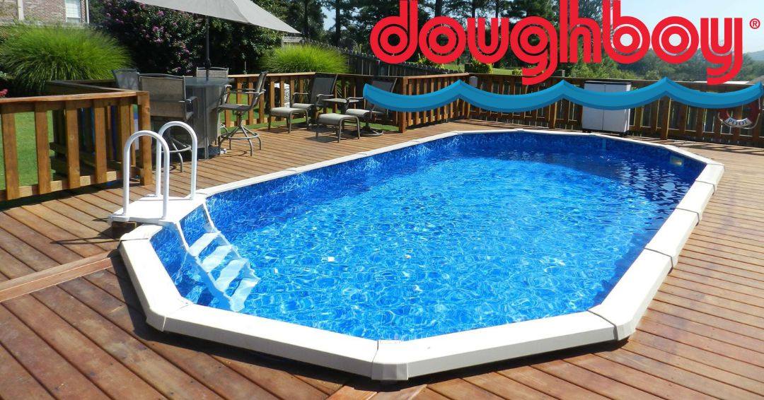 A Doughboy above ground pool inset within a wooden deck.